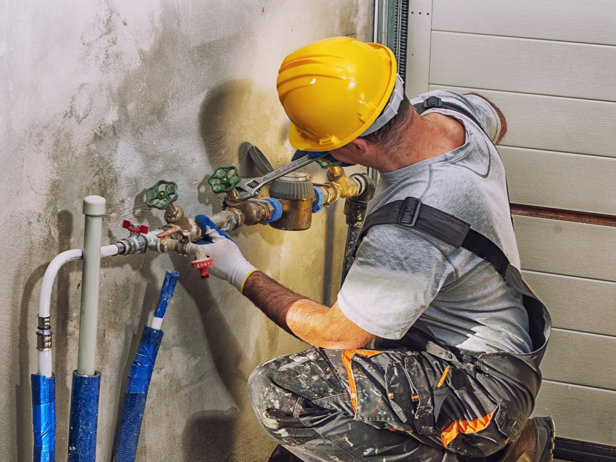 plumber installing